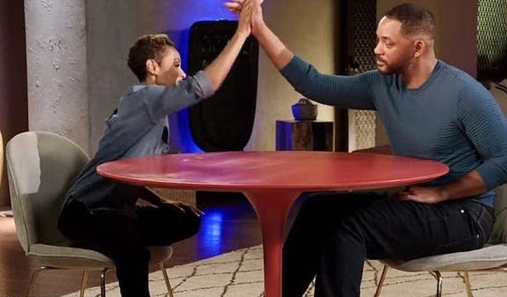 Jada Pinkett Smith hi-fives her husband, Will Smith on an episode of her talk show, Red Table Talk. 