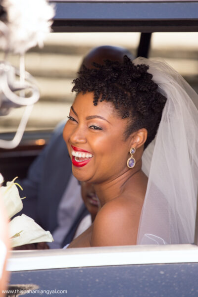 This Bahamian Gyal blogger, Rogan Smith gets ready to exit the vehicle as she celebrates her eighth wedding anniversary at their vow renewal ceremony in The Bahamas.