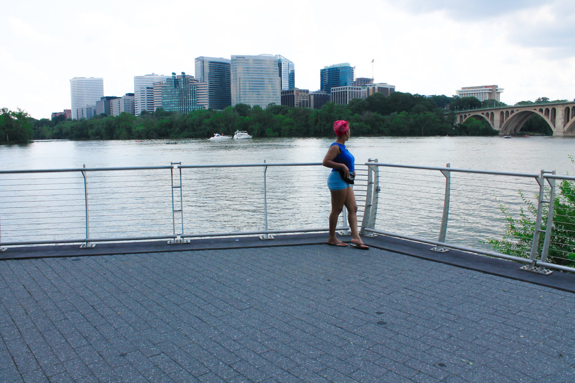 DC blogger, Rogan Smith glances at the Potomac River in Georgetown, DC.