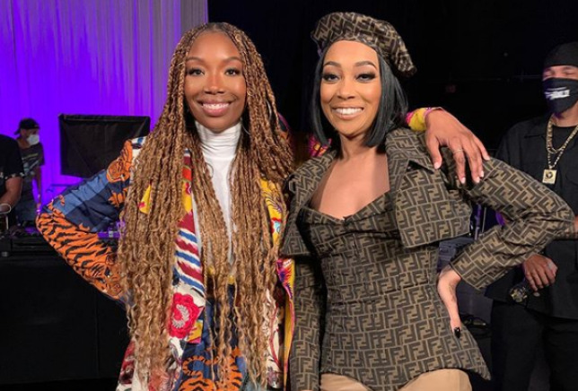 R&B singer Brandy poses with singer, Monica for their verzuz battle