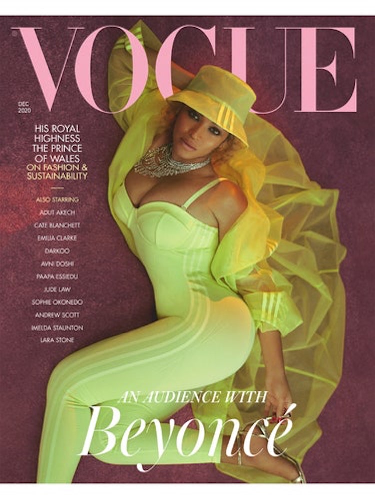 Photo of Beyonce Knowles on the cover of British Vogue. She is wearing a neon green outfit and a green hat.