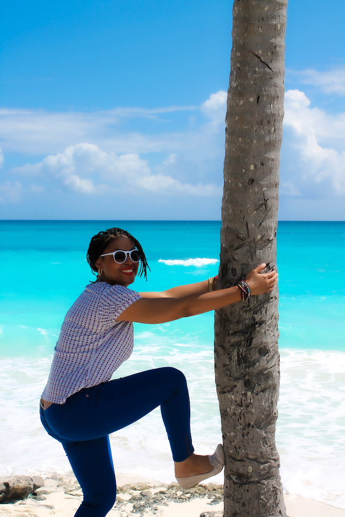 This Bahamian Gyal blogger, Rogan Smith on a beach in Exuma, The Bahamas. If you're considering moving to The Bahamas, you may want to consider living on another island other than Nassau.