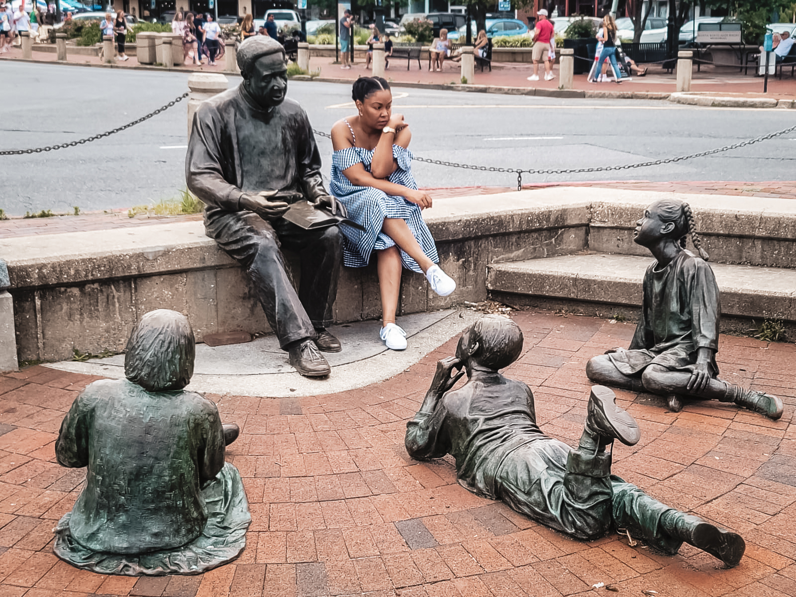 DC blogger Rogan Smith sits at the Alex Haley monument in Annapolis, Maryland
