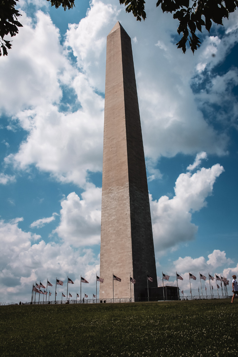 Image of the 555' white and beige Washington Monument in Washington DC