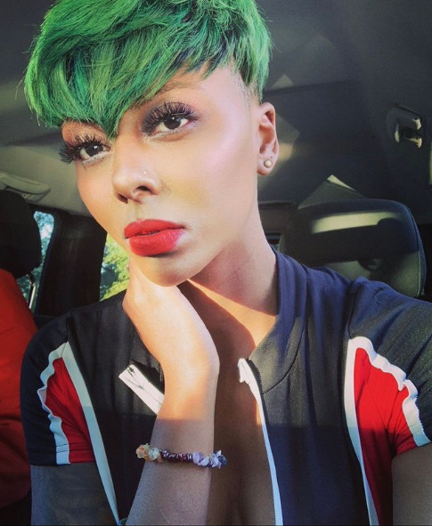@stizzz black model with green hair wears red lipstick