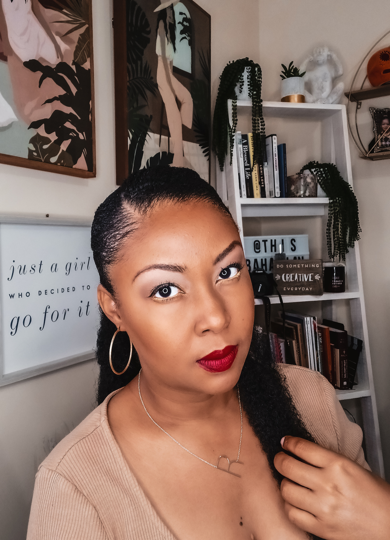 black woman wears red lipstick for fall