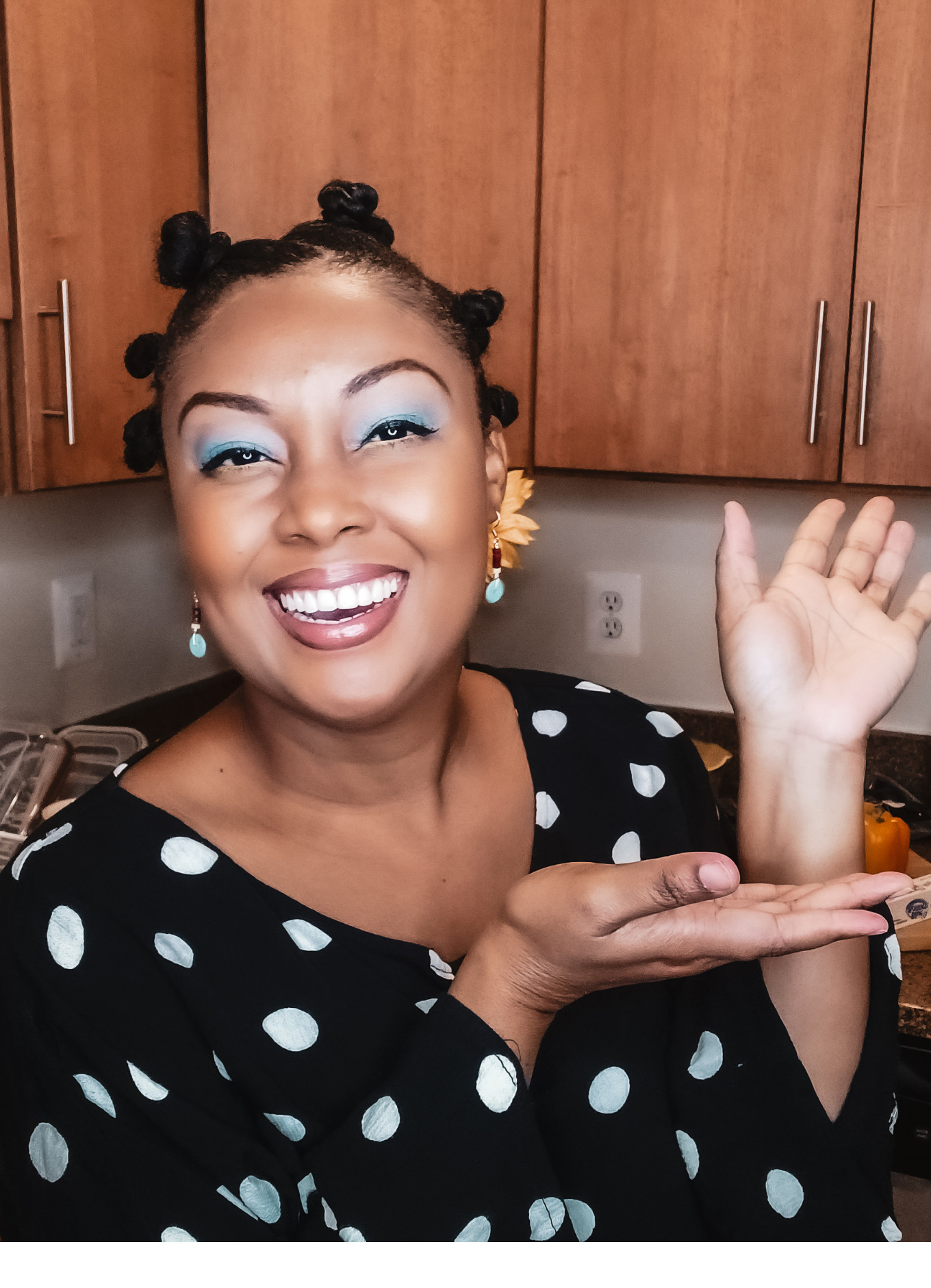 This Bahamian Gyal blogger Rogan Smith smiles in her kitchen as she makes Bahamian macaroni.