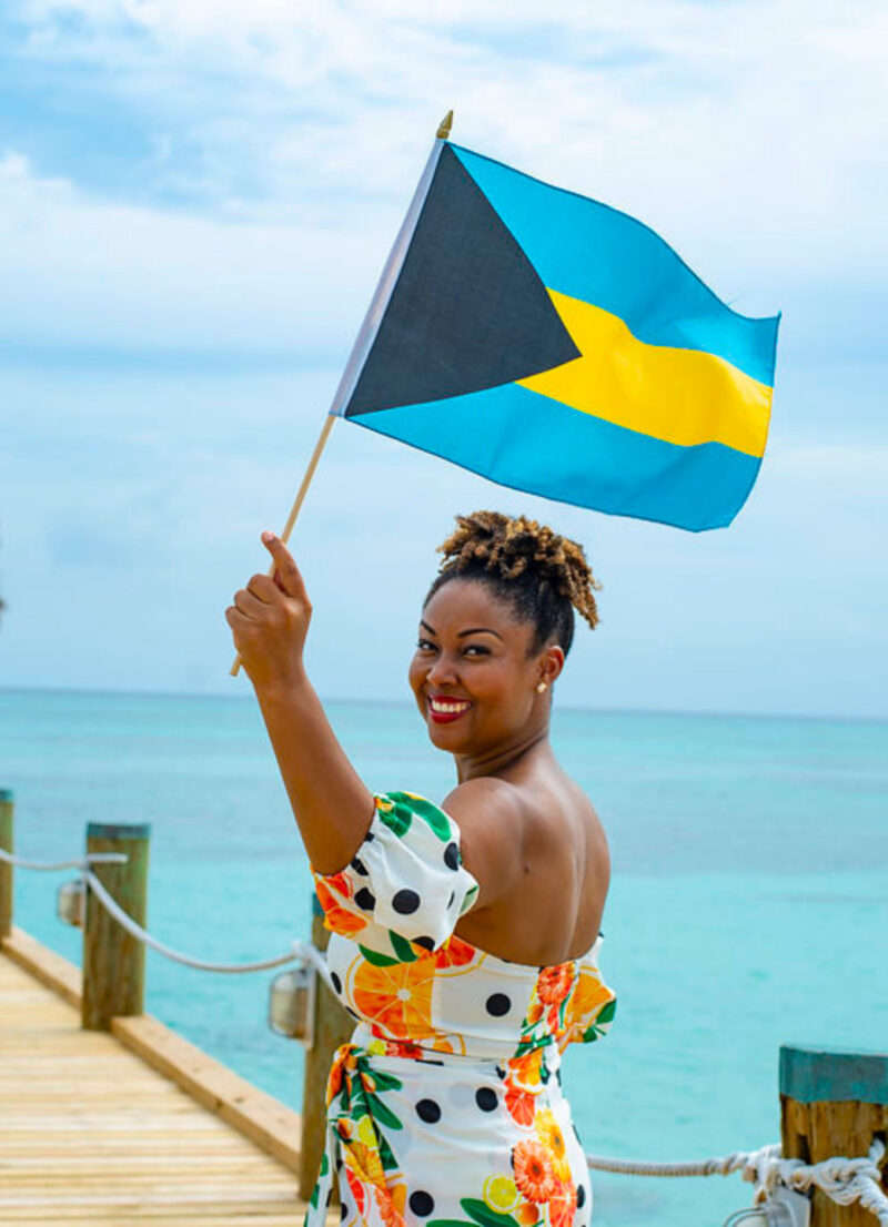 Bahamian blogger Rogan Smith waves her Bahamian flag. (Photo/T Glinton Photography)