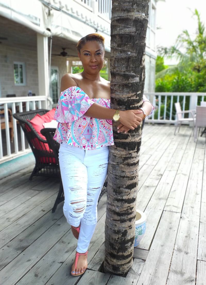 This Bahamian Gyal blogger Rogan Smith hugs a tree at the A Stone's Throw Away hotel in Nassau, Bahamas