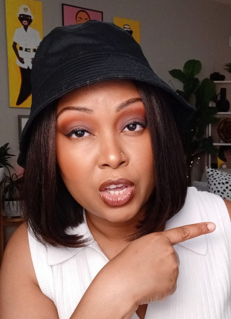 This Bahamian Gyal Blogger, Rogan sports a shoulder length Bob and a black bucket hat.