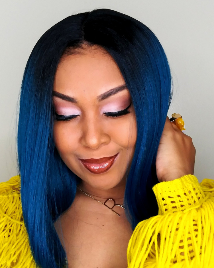 This Bahamian Gyal blogger, Rogan Smith wears a Bobbi Boss premium synthetic wig in teal. 