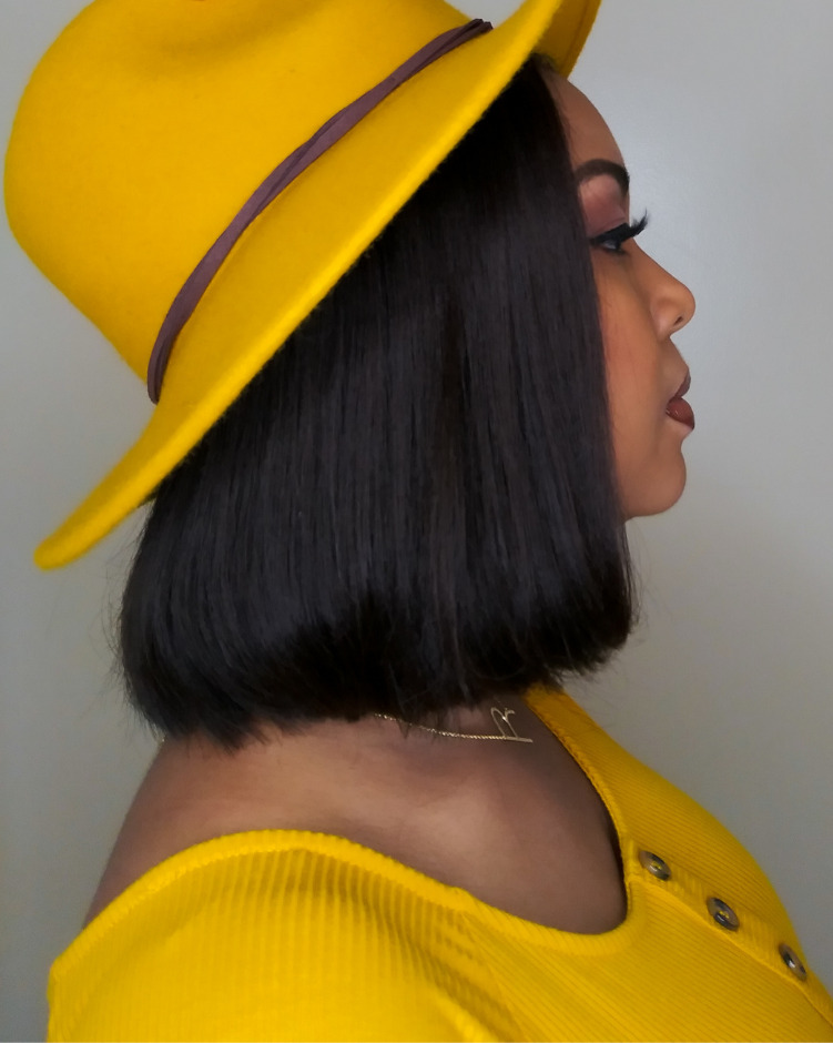 A side view of this mustard Universal Thread fedora. 