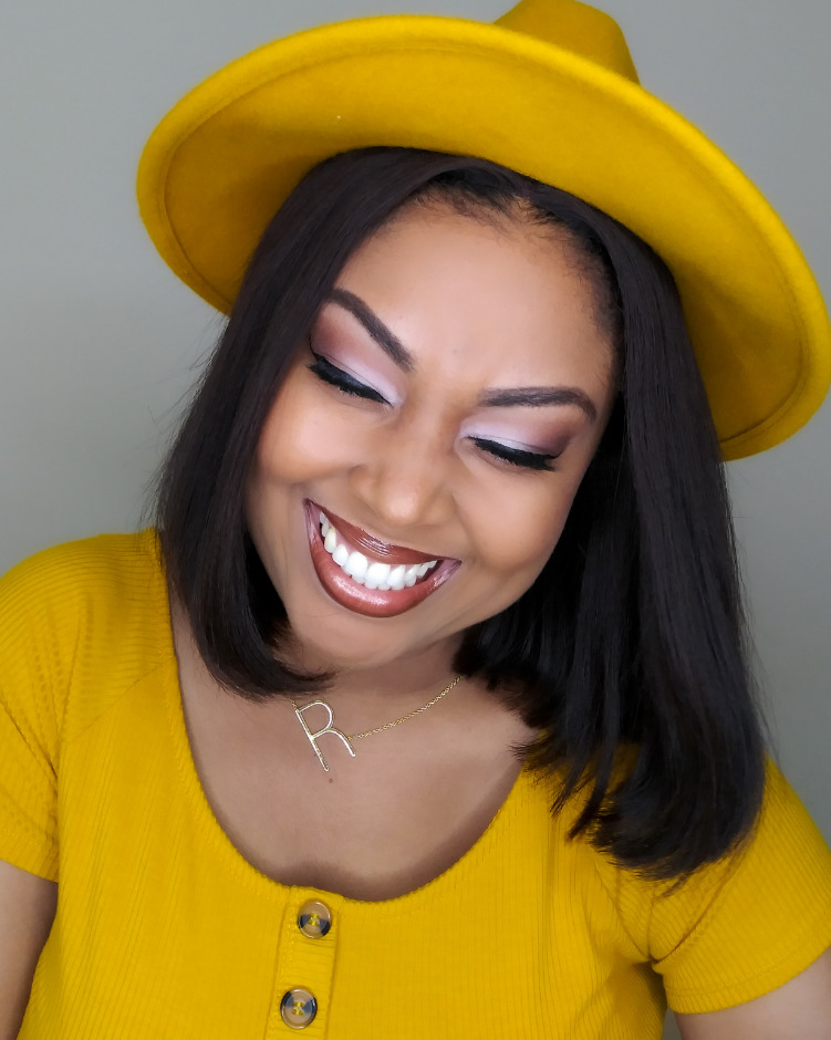 This Bahamian Gyal blogger, Rogan Smith shows off her mustard Universal Thread fedora.