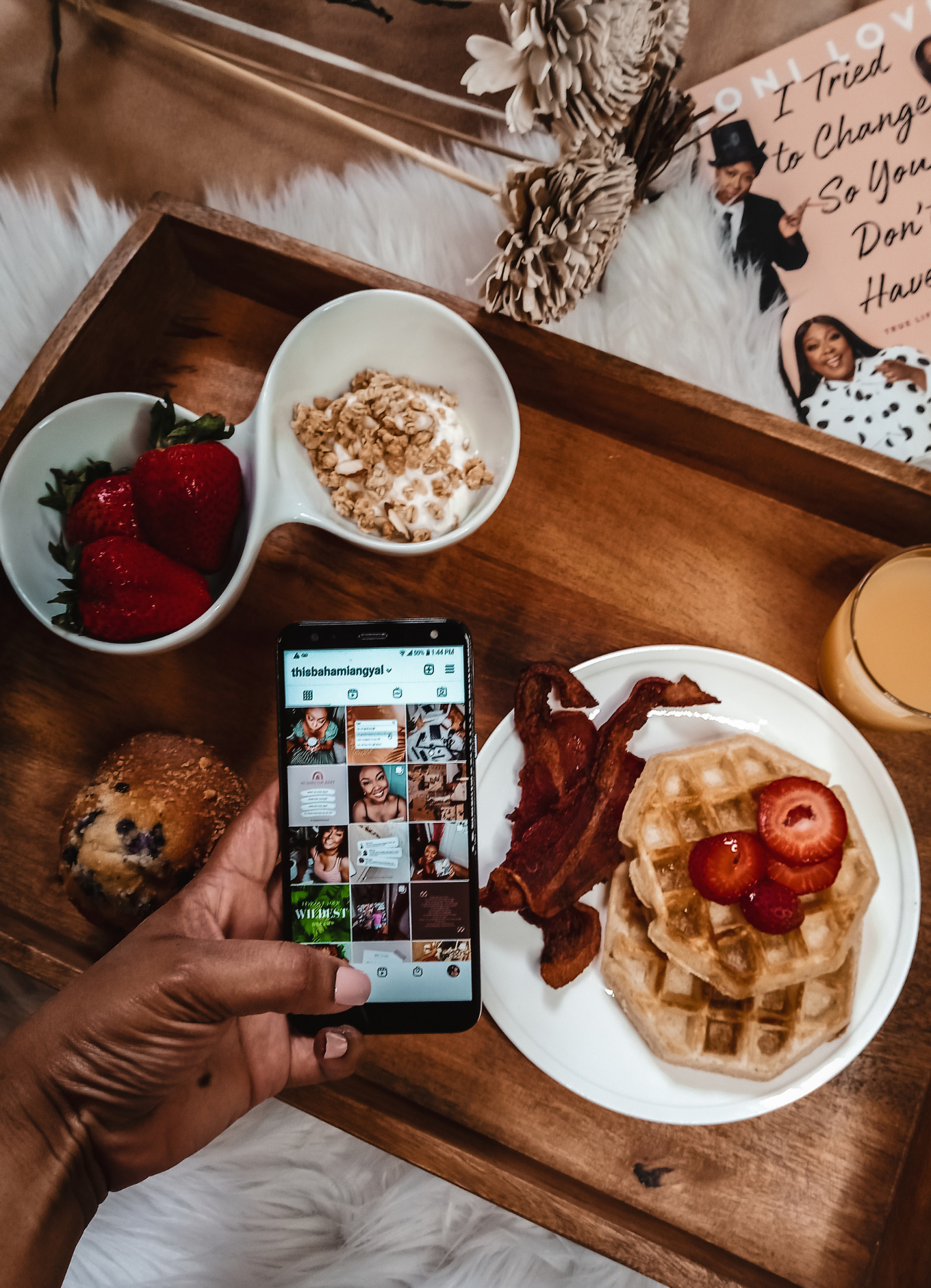 Flat lay of breakfast, cell phone with instagram