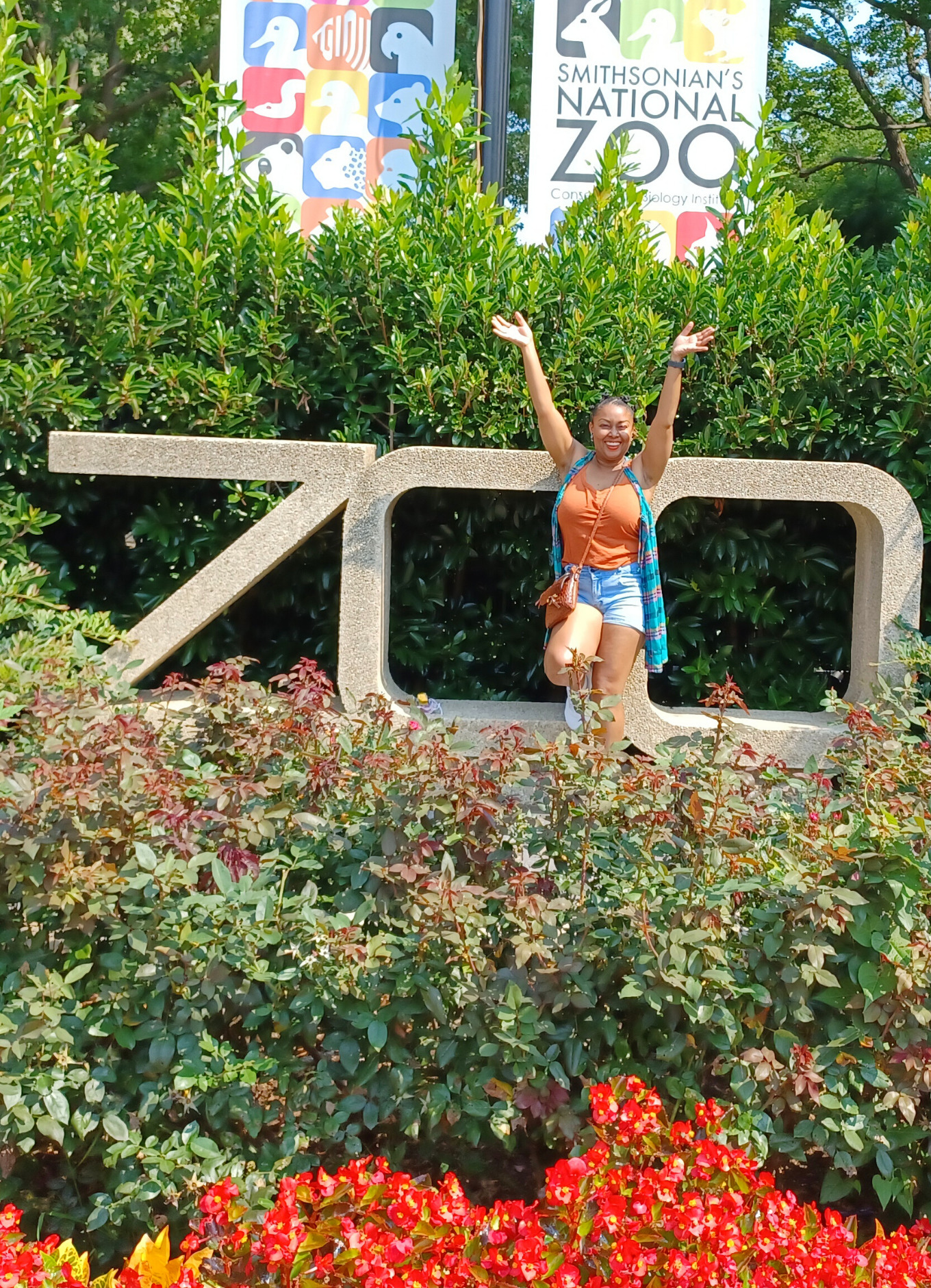 This Bahamian Gyal blogger, Rogan Smith smiles in front of the Smithsonian National Zoo in Washington DC