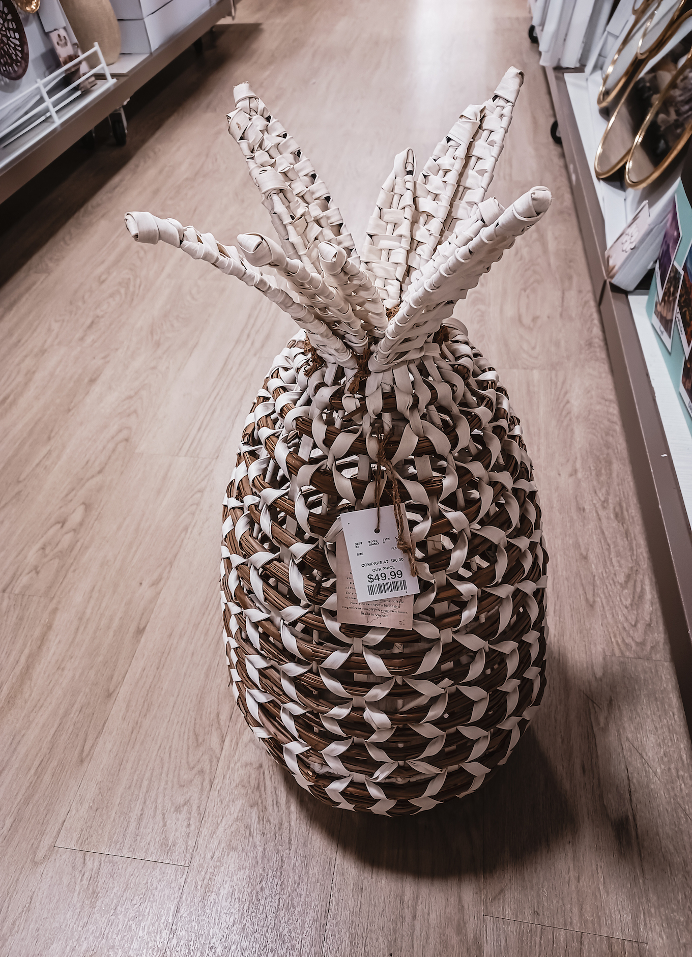 Juicy fruit. An adorable wicker pineapple at HomeGoods.