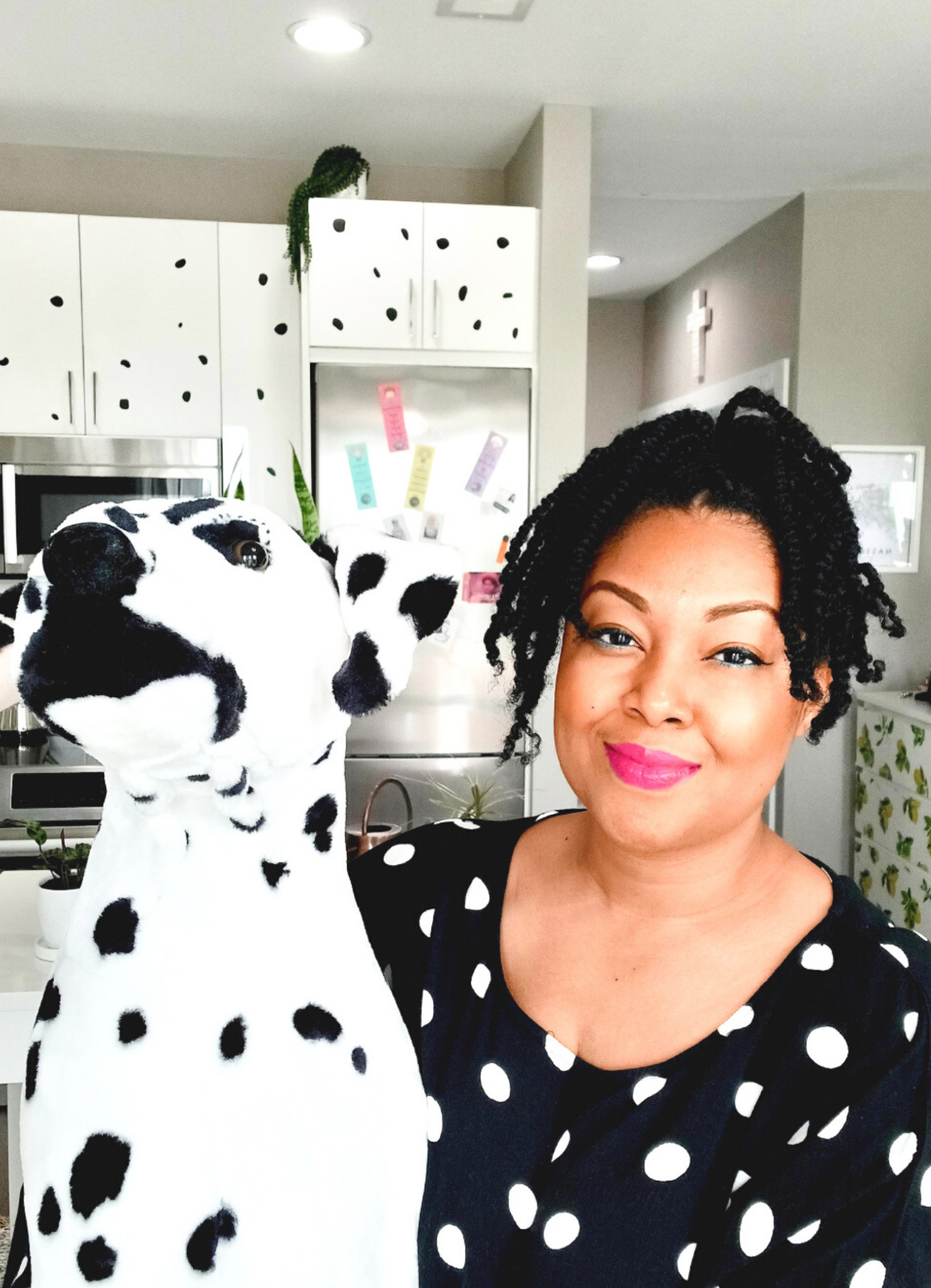 This Bahamian Gyal blogger, Rogan Smith poses with a plush Dalmatian dog