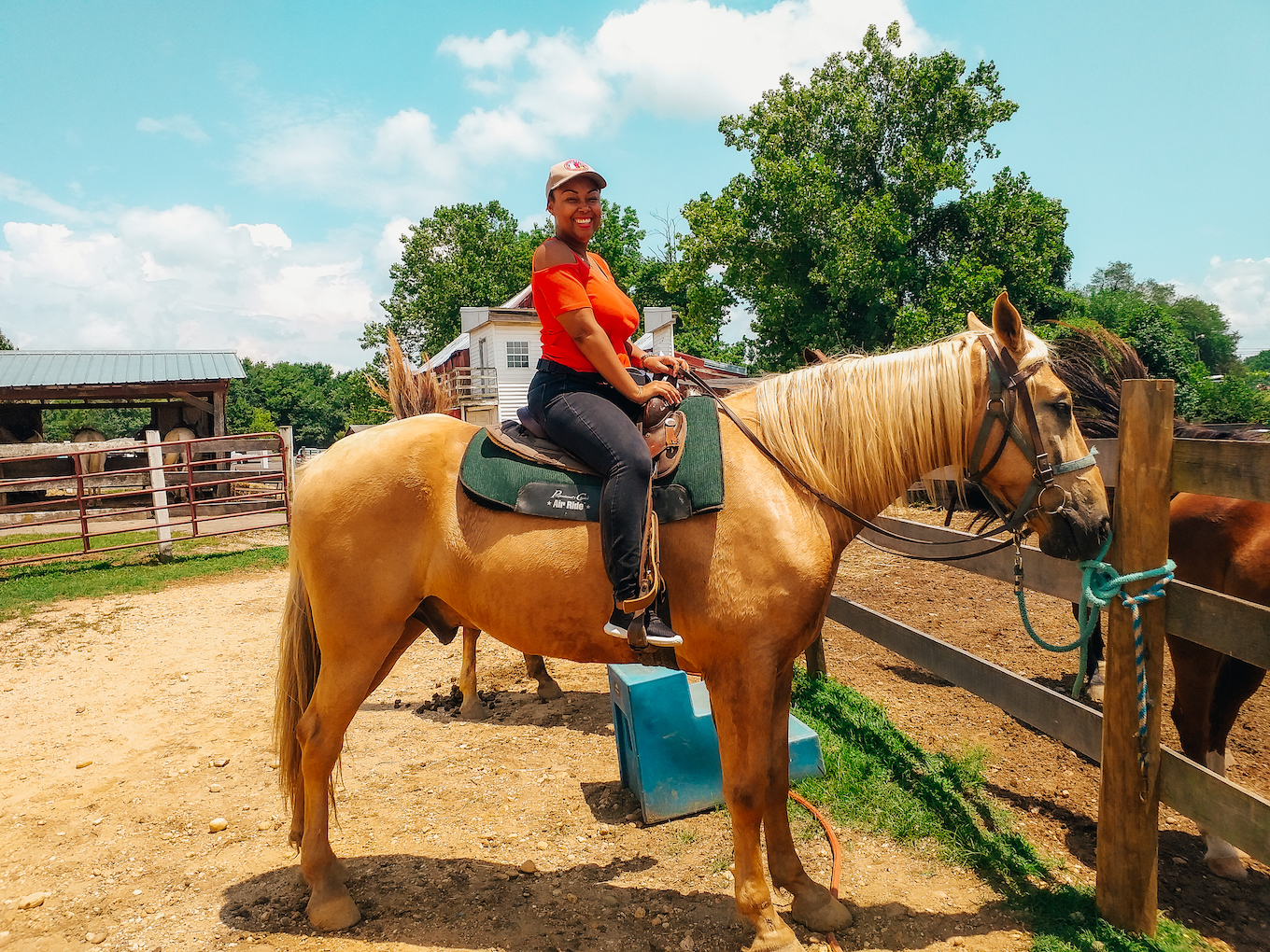 This Bahamian Gyal blogger, Rogan sits high on her horse at Piscataway Farm. She is smiling for the camera.