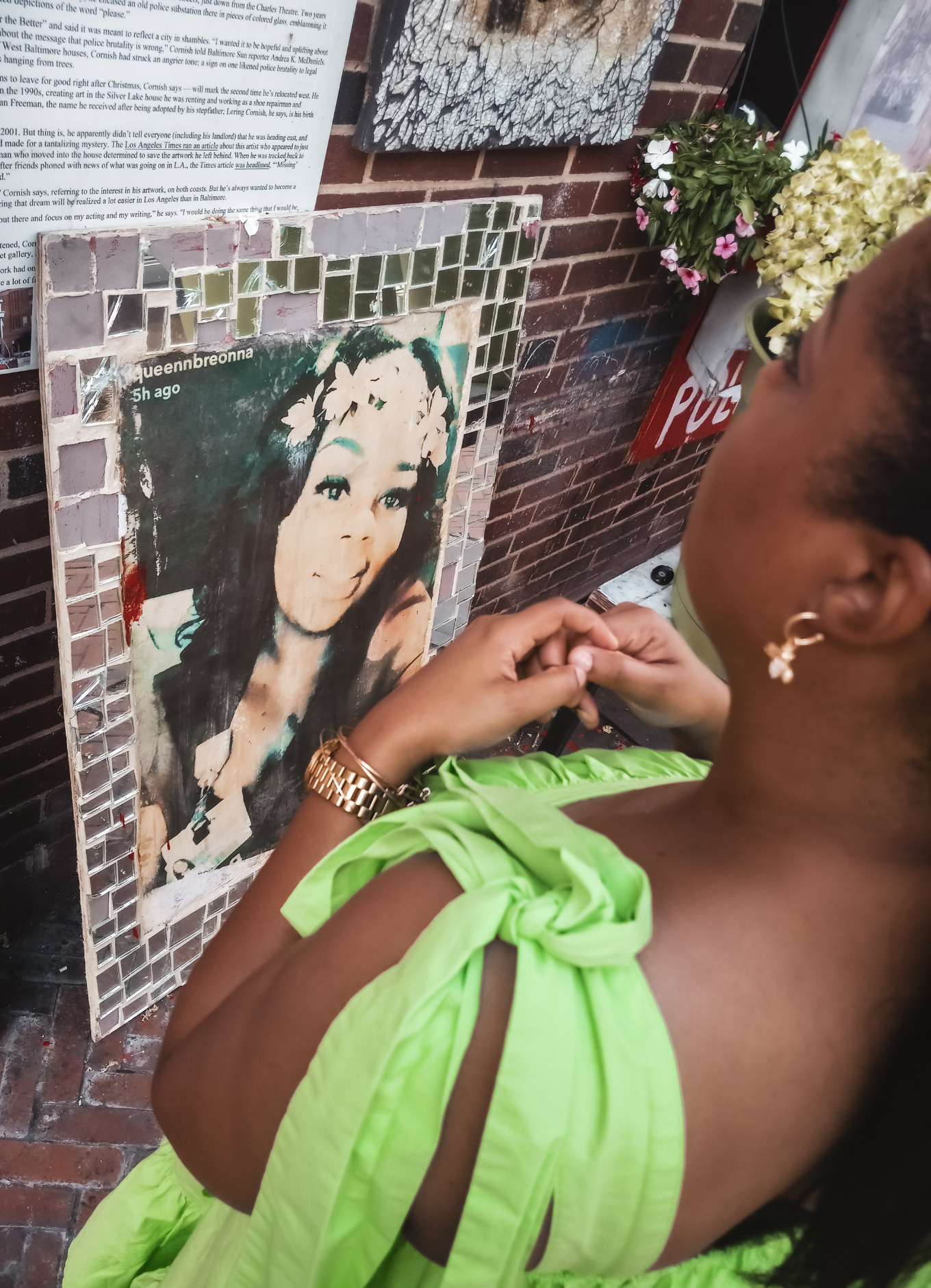 This Bahamian Gyal blogger, Rogan stands in front of a memorial for Breonna Taylor, a medical worker who was shot and killed by police officers in her Louisville, Kentucky apartment.