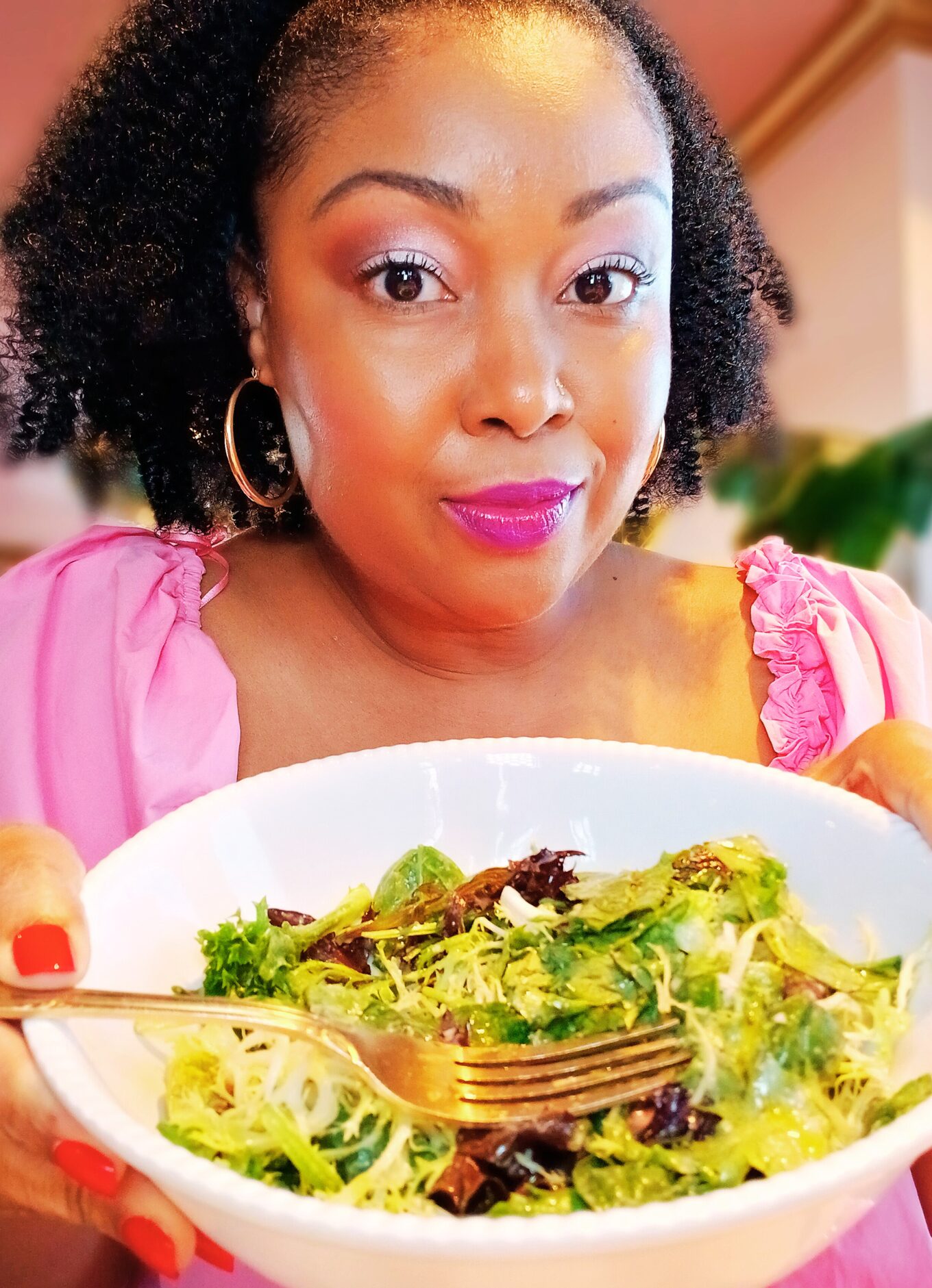 Blogger Rogan poses with a big bowl of salad at White Limozeen