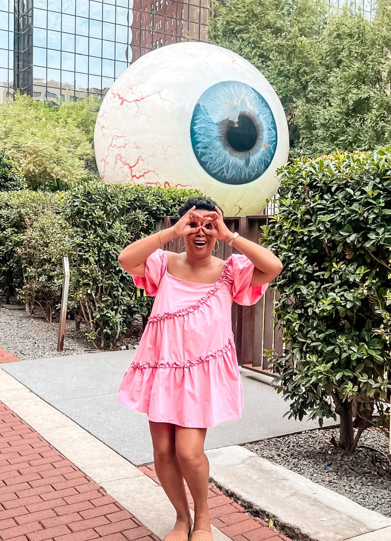 This Bahamian Gyal blogger, Rogan in Dallas Texas. She poses with the big eye downtown