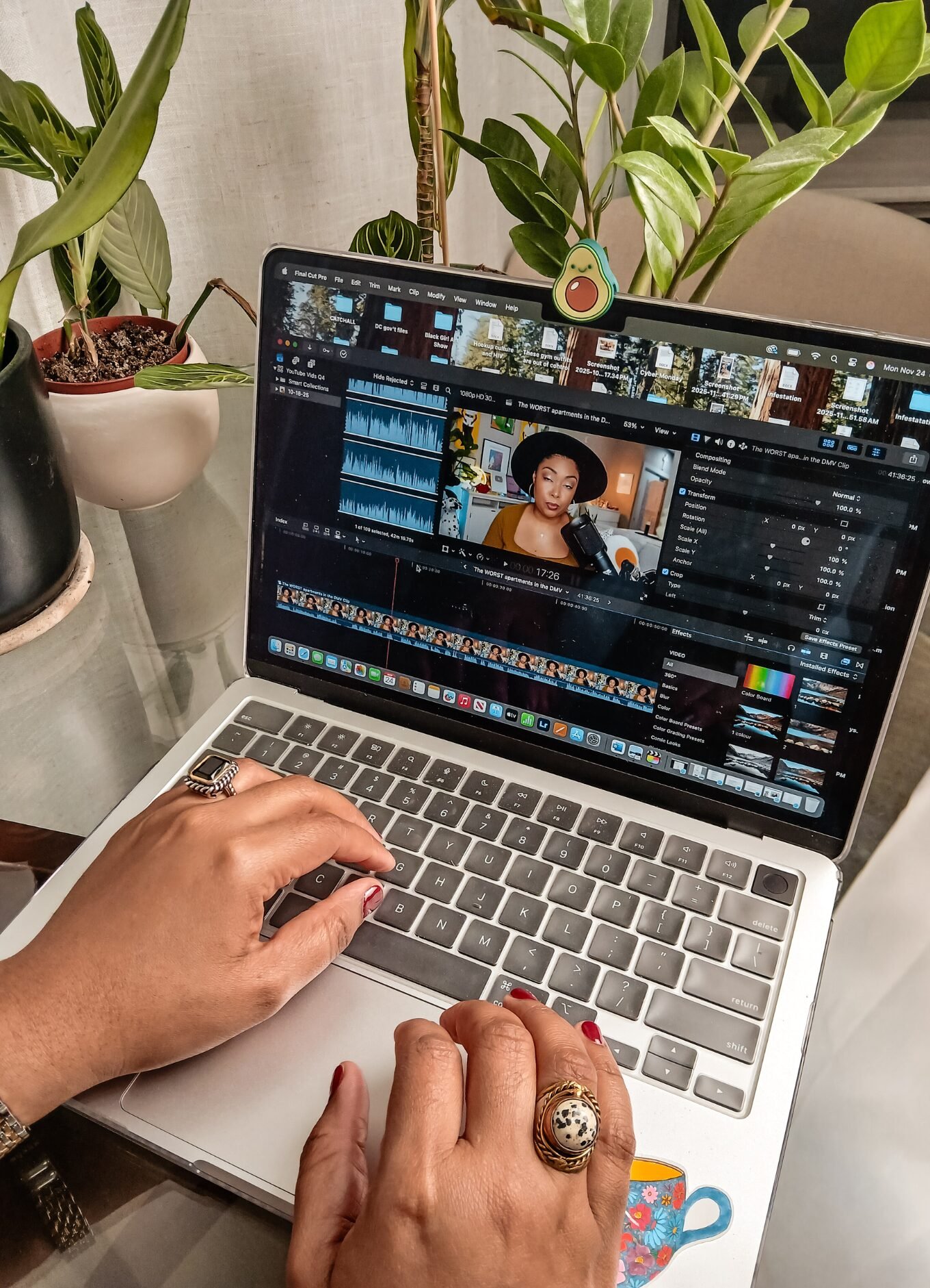DC based blogger, Rogan of This Bahamian Gyal edits a YouTube video on her Apple laptop