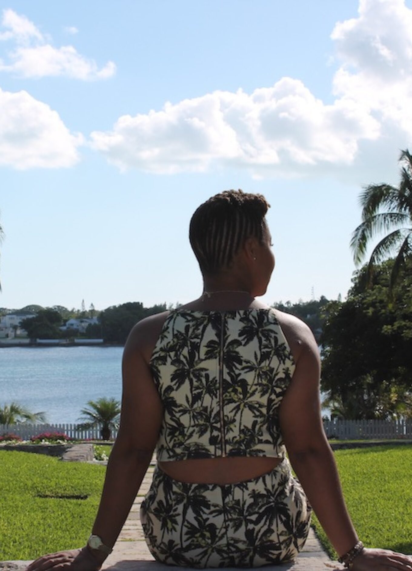 This Bahamian Gyal Blogger, Rogan sits at The Cloisters on Paradise Island, Bahamas staring off into the distance