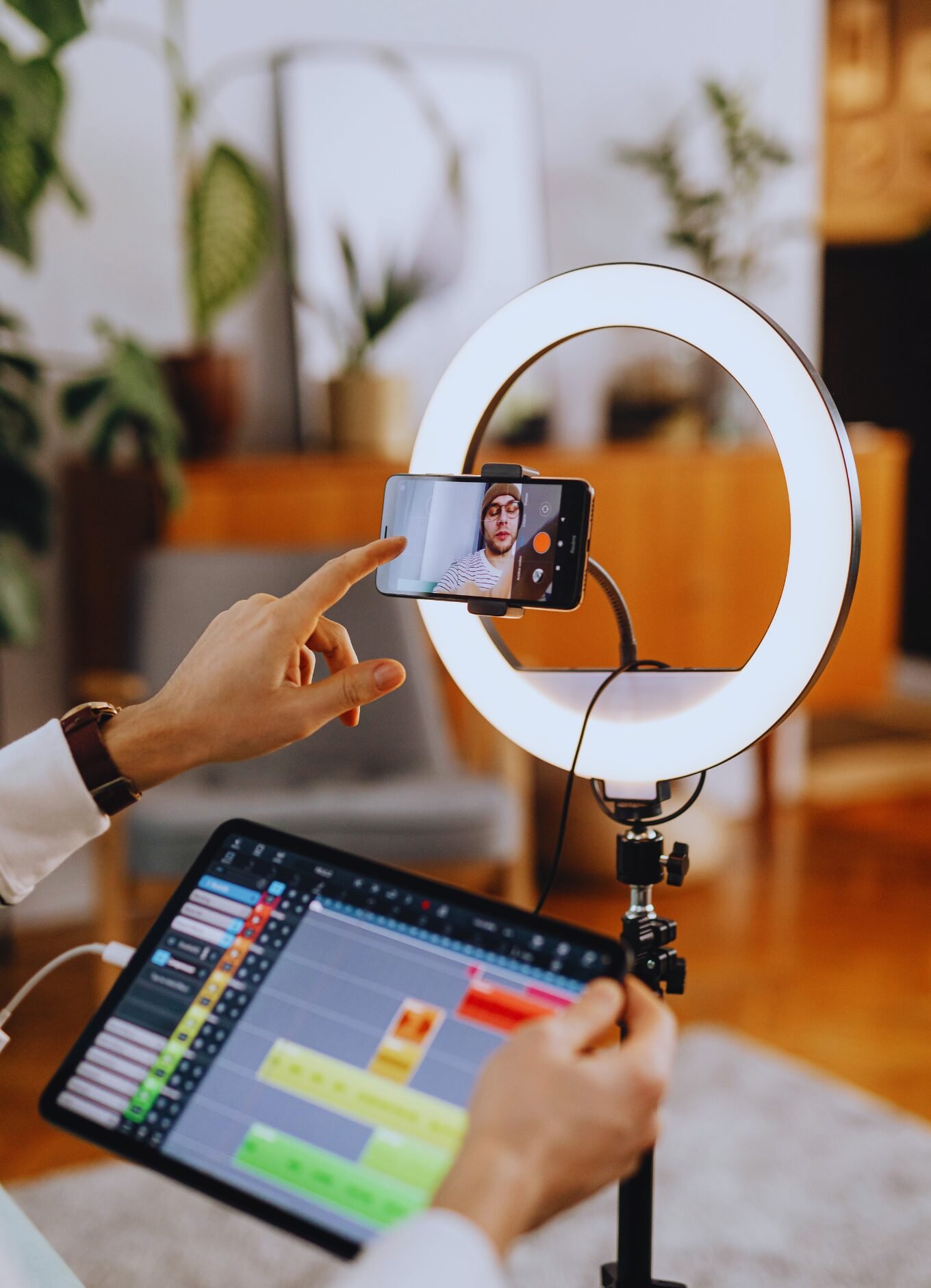 content creator records into ring light