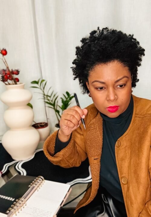 Blogger and YouTuber, Rogan brainstorms ideas for her YouTube channel