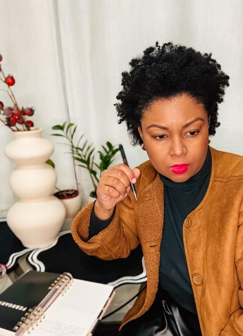 Blogger and YouTuber, Rogan brainstorms ideas for her YouTube channel